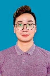 A person wearing glasses and a purple shirt

Description automatically generated
